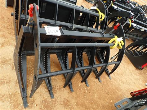 skid steer root rake canada|root rake for skid loader.